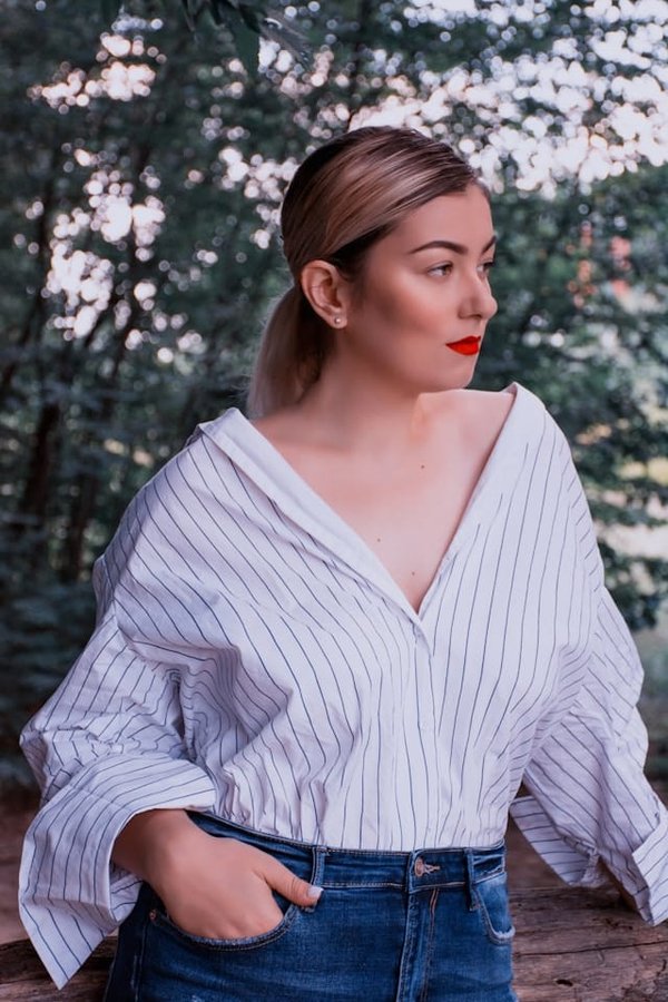 How to Wear a Semi-Sheer Blouse in a Professional Setting While Maintaining Modesty?